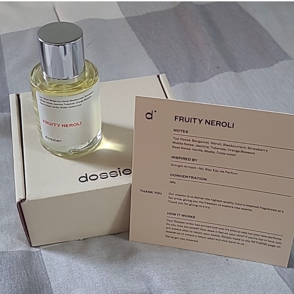 New in box.  Fruity Neroli Dossier perfume